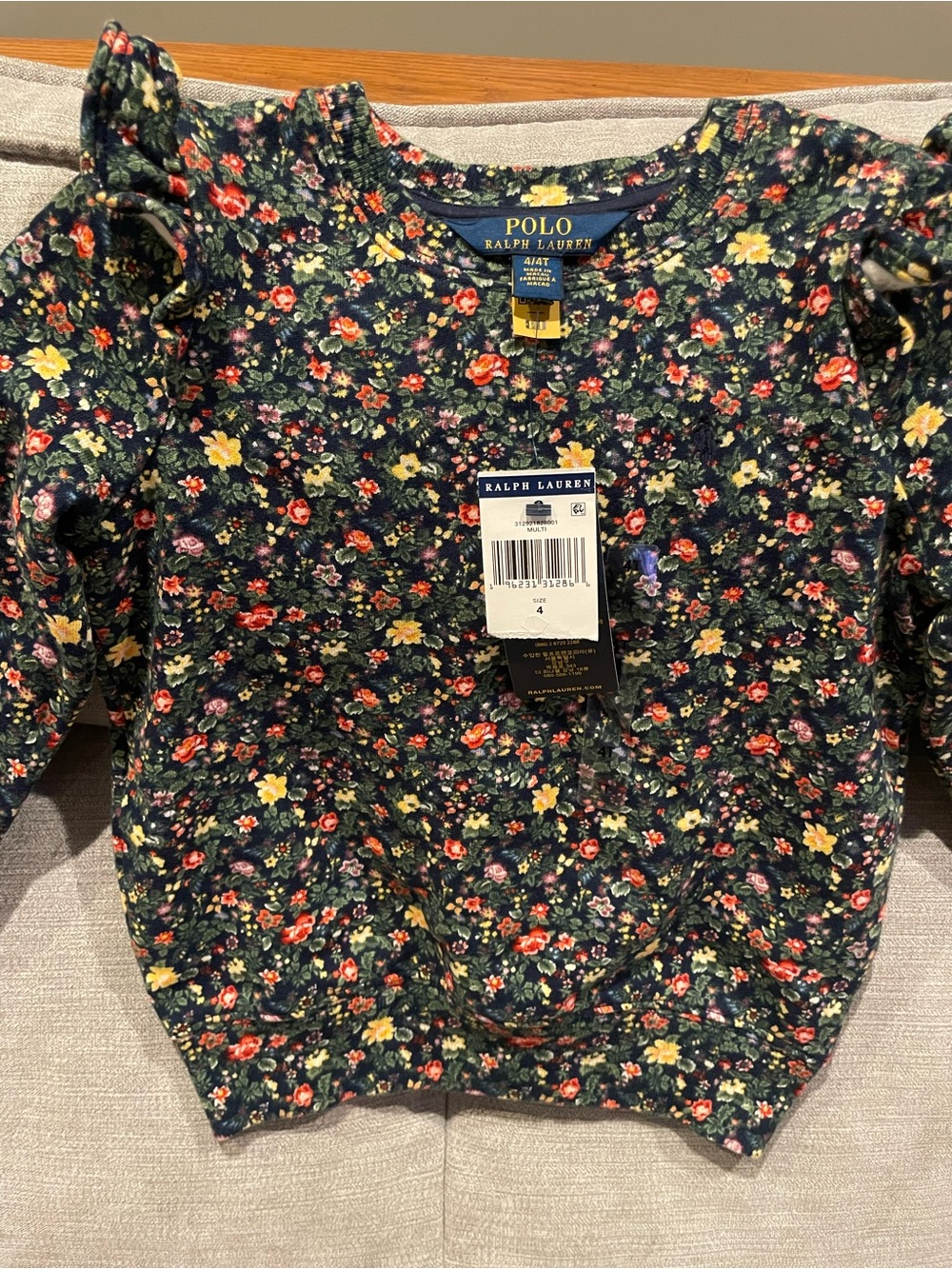 Polo by Ralph Lauren Multi Floral Long Sleeve Ruffle Shoulder sweatshirt.Size 4T